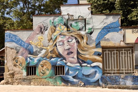 Een mural in Pristina
