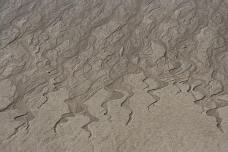 Speels effect in het strand zand